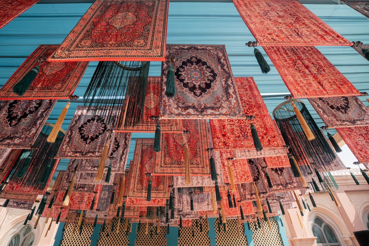 A canopy of suspended carpets
